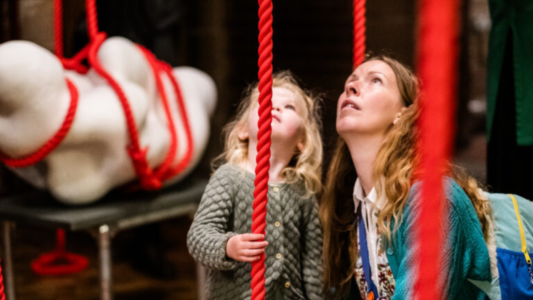 Visitors interact with Mella Shaw's Sounding Line